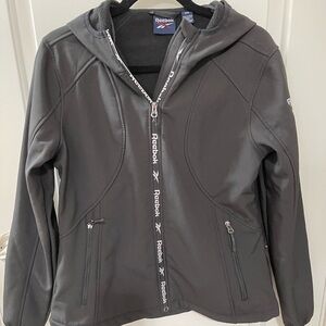 Reebok fitted black  running jacket size medium with hood.